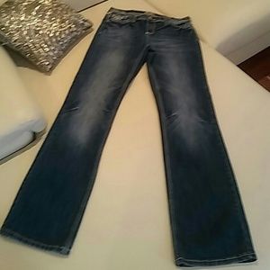 Soundgirl/ embellished distressed boot cut jeans.